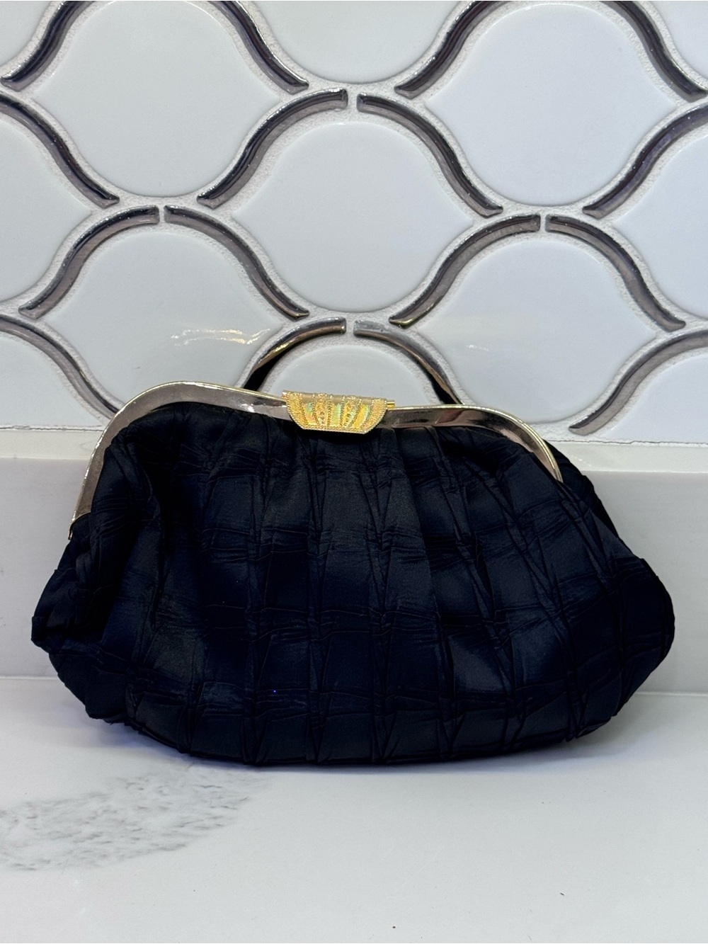 Elegant Black Satin Clutch with Gold Accent